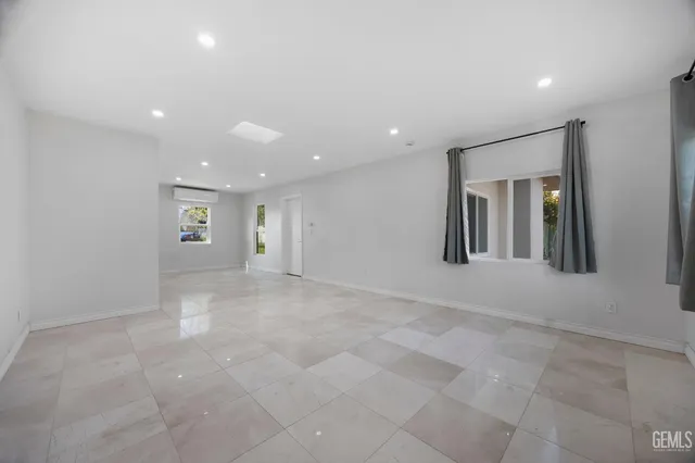 a view of livingroom and a bathroom