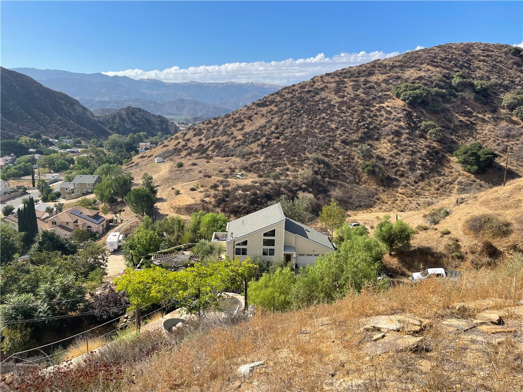 0 Chiquita Canyon Road Val Verde, CA 91384 - Photo 5 of 16 a view of a large building with a mountain in the background