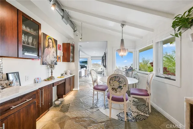 a view of a balcony with chairs