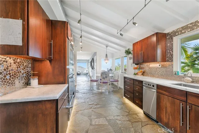 a bedroom with bed and window