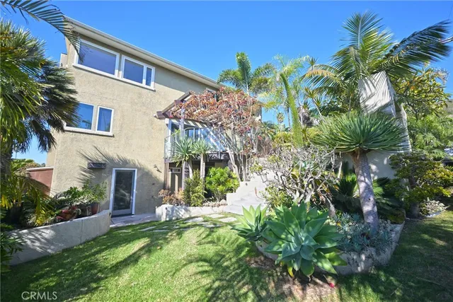 a spacious bathroom with a granite countertop tub a mirror and shower