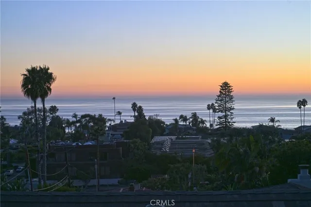 a view of a bench in a backyard