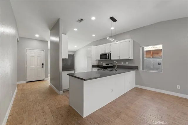 a view of a livingroom with a flat screen tv