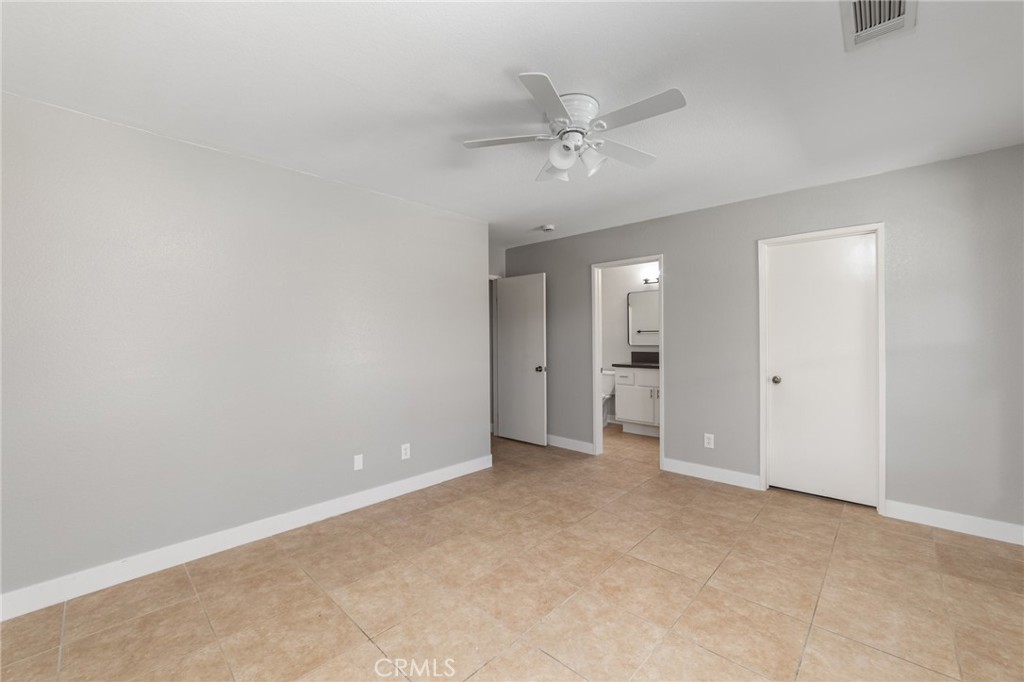 50855 Chiapas Drive Coachella, CA 92236 - Photo 23 of 34 a view of an empty room with a chandelier fan