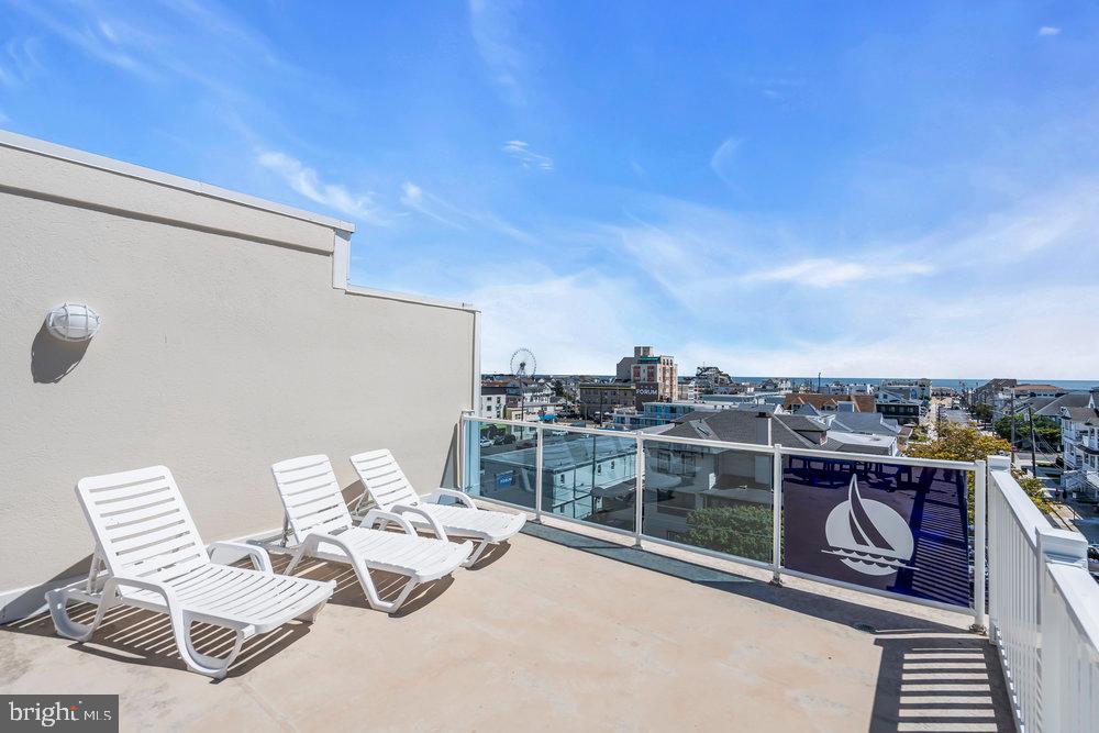812 Ocean Avenue, Unit 420 Ocean City, NJ 08226 - Photo 20 of 20 a view of a terrace with chairs