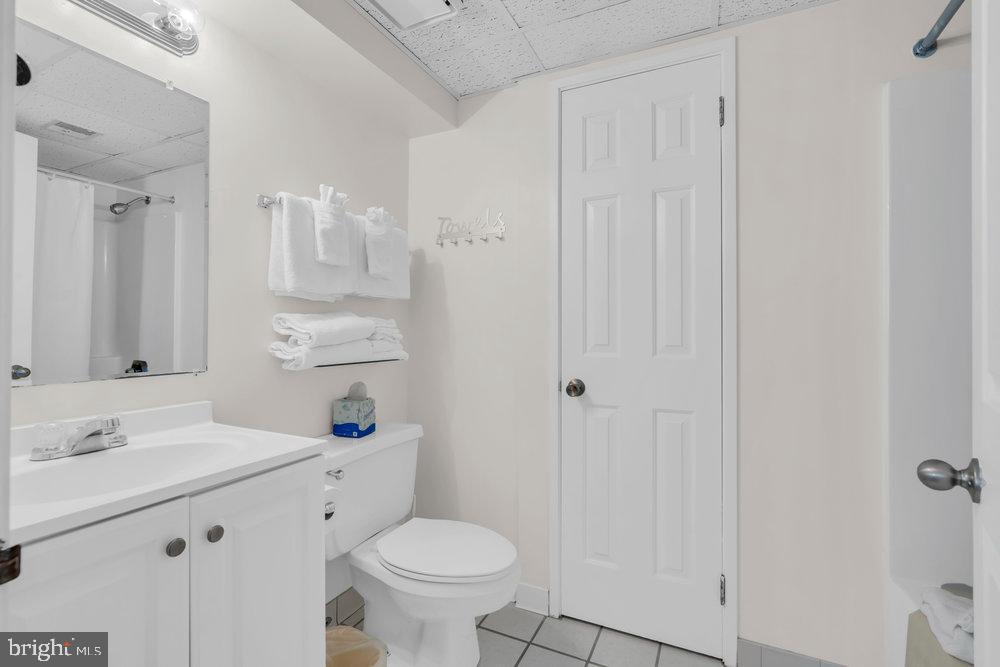 812 Ocean Avenue, Unit 420 Ocean City, NJ 08226 - Photo 9 of 20 a bathroom with a sink toilet and shower