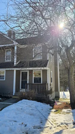 a view of house with yard