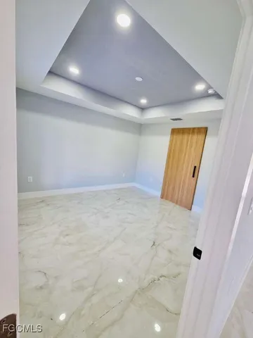 en empty room with windows