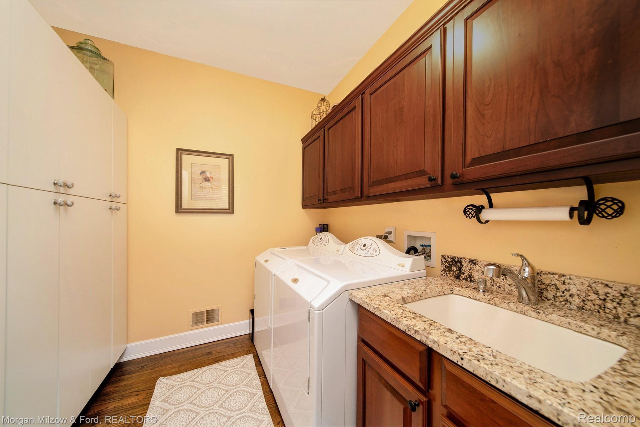 6602 Steeple Ridge Clarkston, MI 48346 - Photo 10 of 38 First floor laundry room