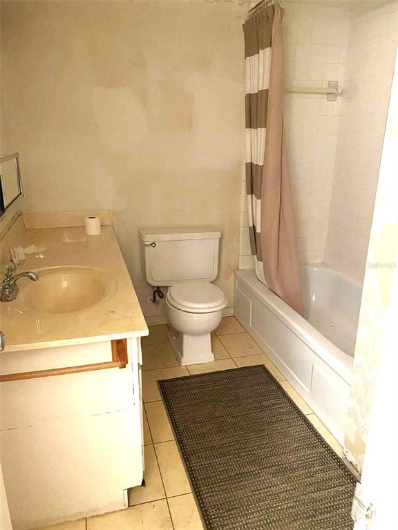1935 South Conway Road, Unit D1 Orlando, FL 32812 - Photo 11 of 21 a bathroom with a toilet and a sink