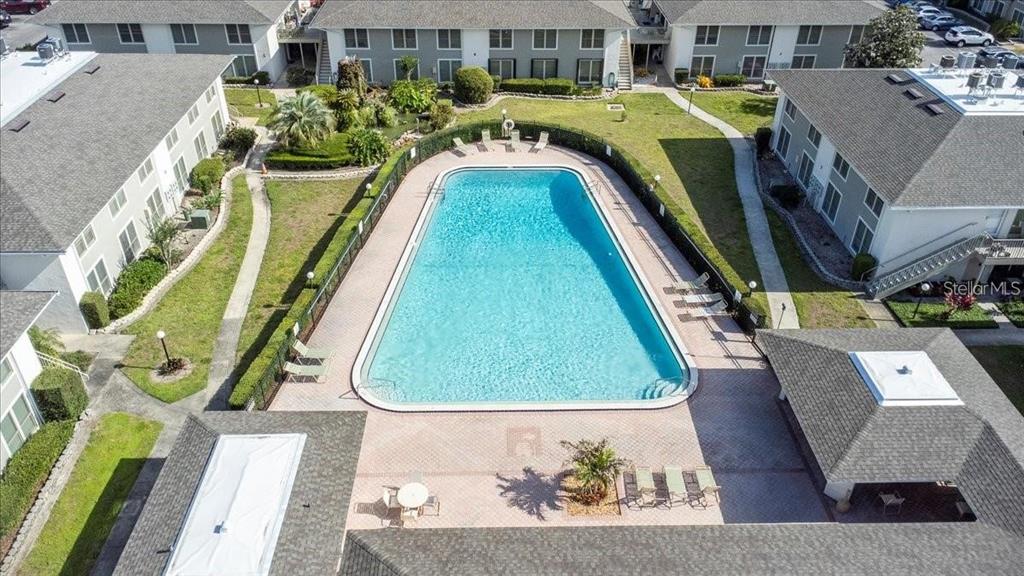 1935 South Conway Road, Unit D1 Orlando, FL 32812 - Photo 21 of 21 an aerial view of a swimming pool