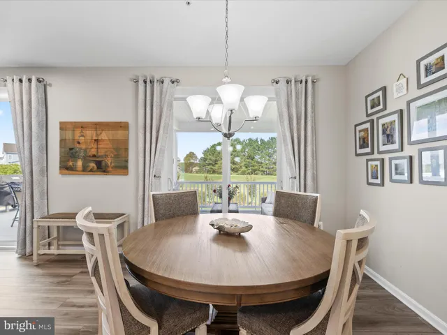 a bathroom with a sink mirror and toilet