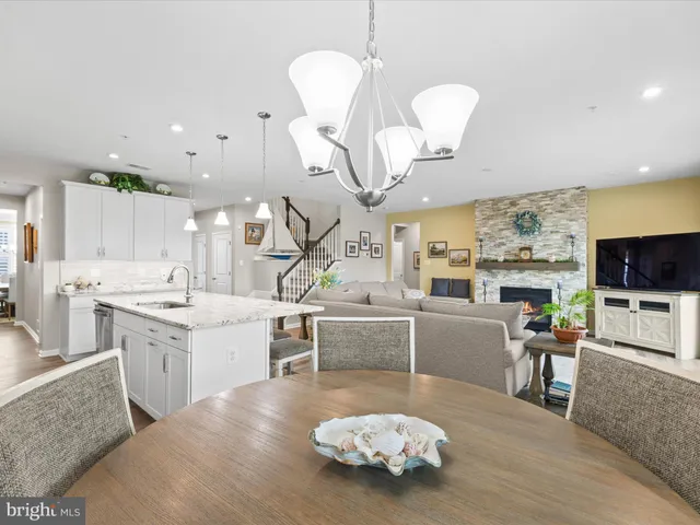 a bedroom with two beds and a table