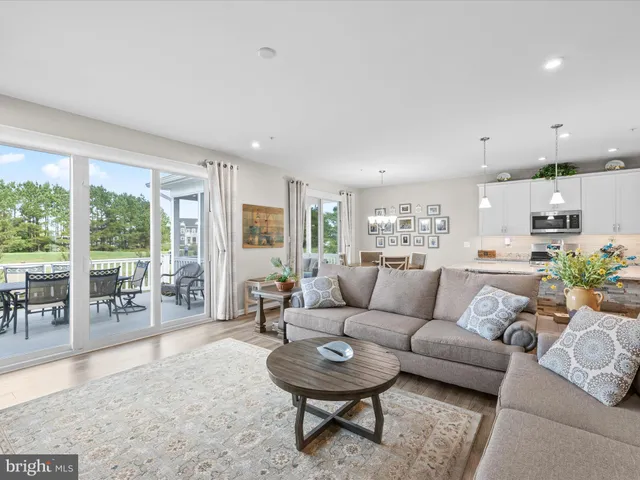 a view of walk in closet with clothes