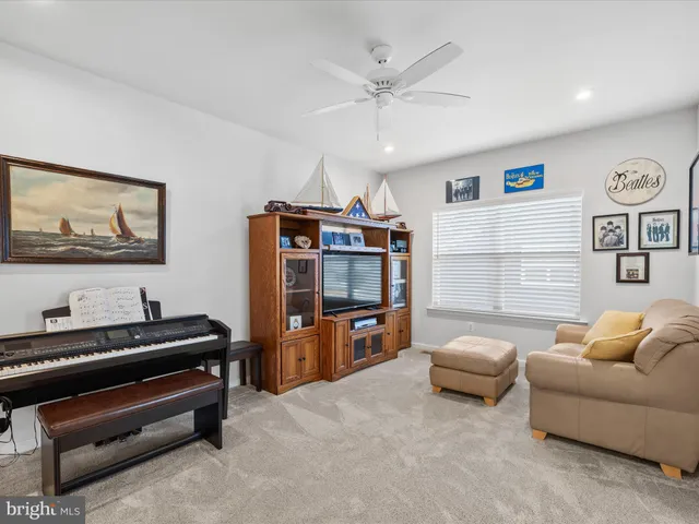 a view of a chairs on the roof deck