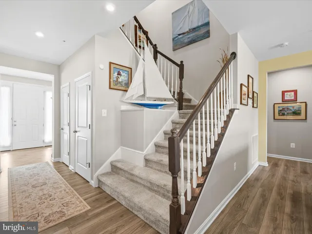 a view of a livingroom with workspace and a couch