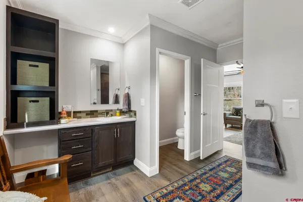 a bedroom with a bed and a closet
