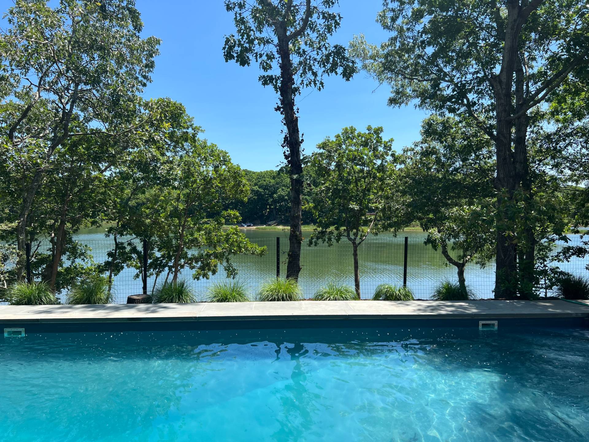 93 Isle Of Wight Road East Hampton, NY 11937 - Photo 1 of 17 a view of a lake