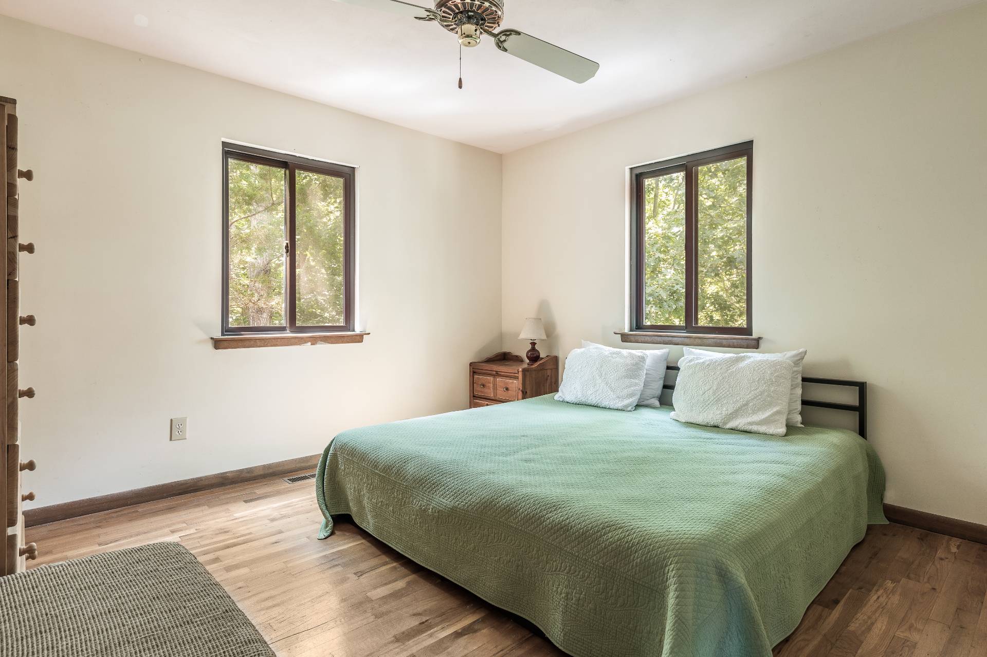 93 Isle Of Wight Road East Hampton, NY 11937 - Photo 13 of 17 a bedroom with a bed and a window