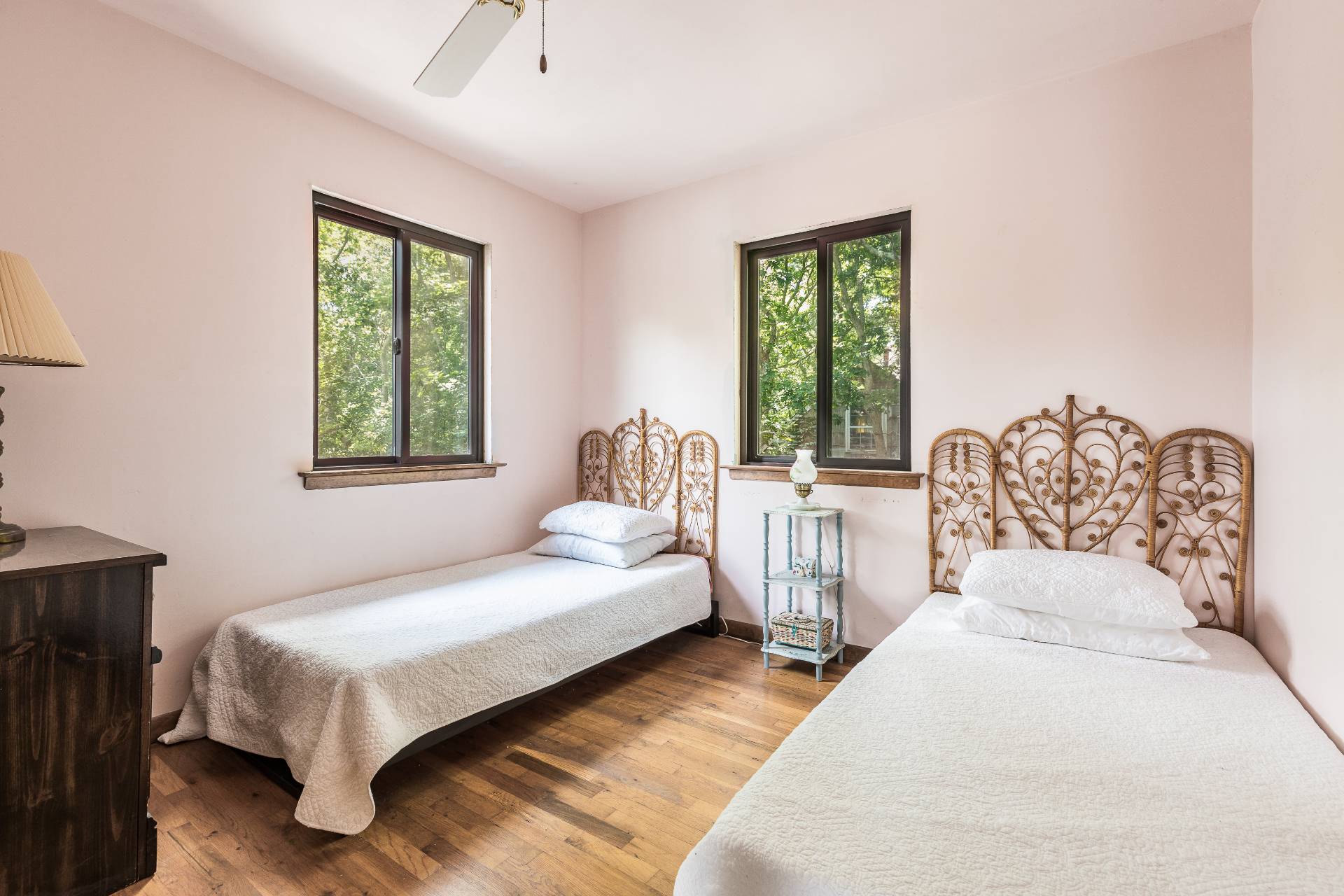93 Isle Of Wight Road East Hampton, NY 11937 - Photo 14 of 17 a spacious bedroom with two beds and a window