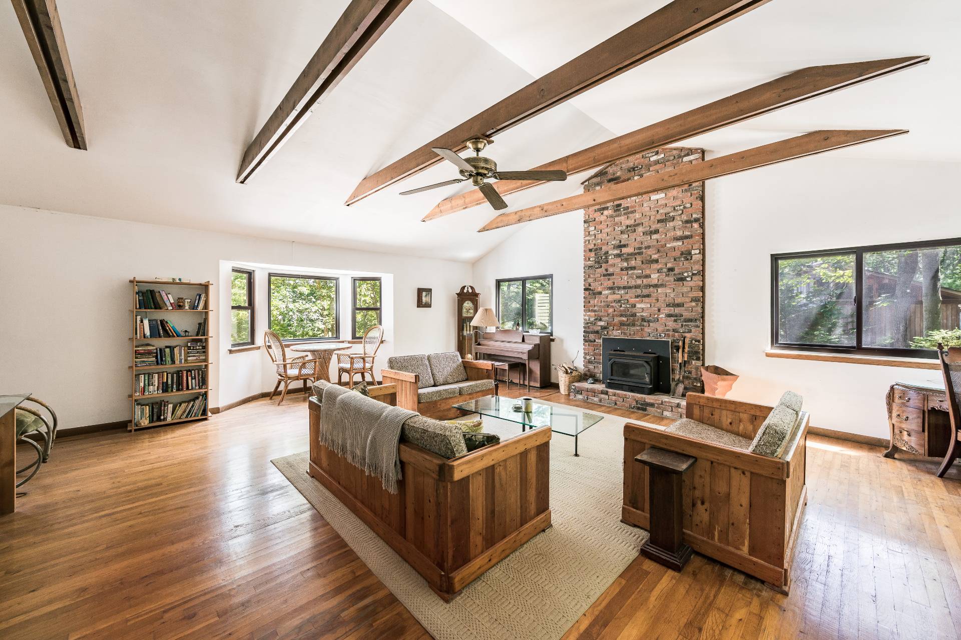 93 Isle Of Wight Road East Hampton, NY 11937 - Photo 6 of 17 a living room with furniture fireplace and flat screen tv