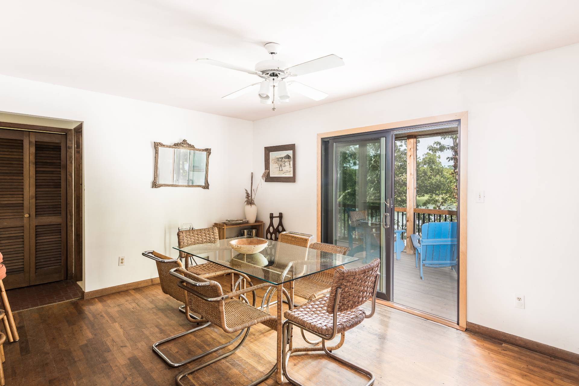 93 Isle Of Wight Road East Hampton, NY 11937 - Photo 8 of 17 a view of a dining room with furniture window and wooden floor