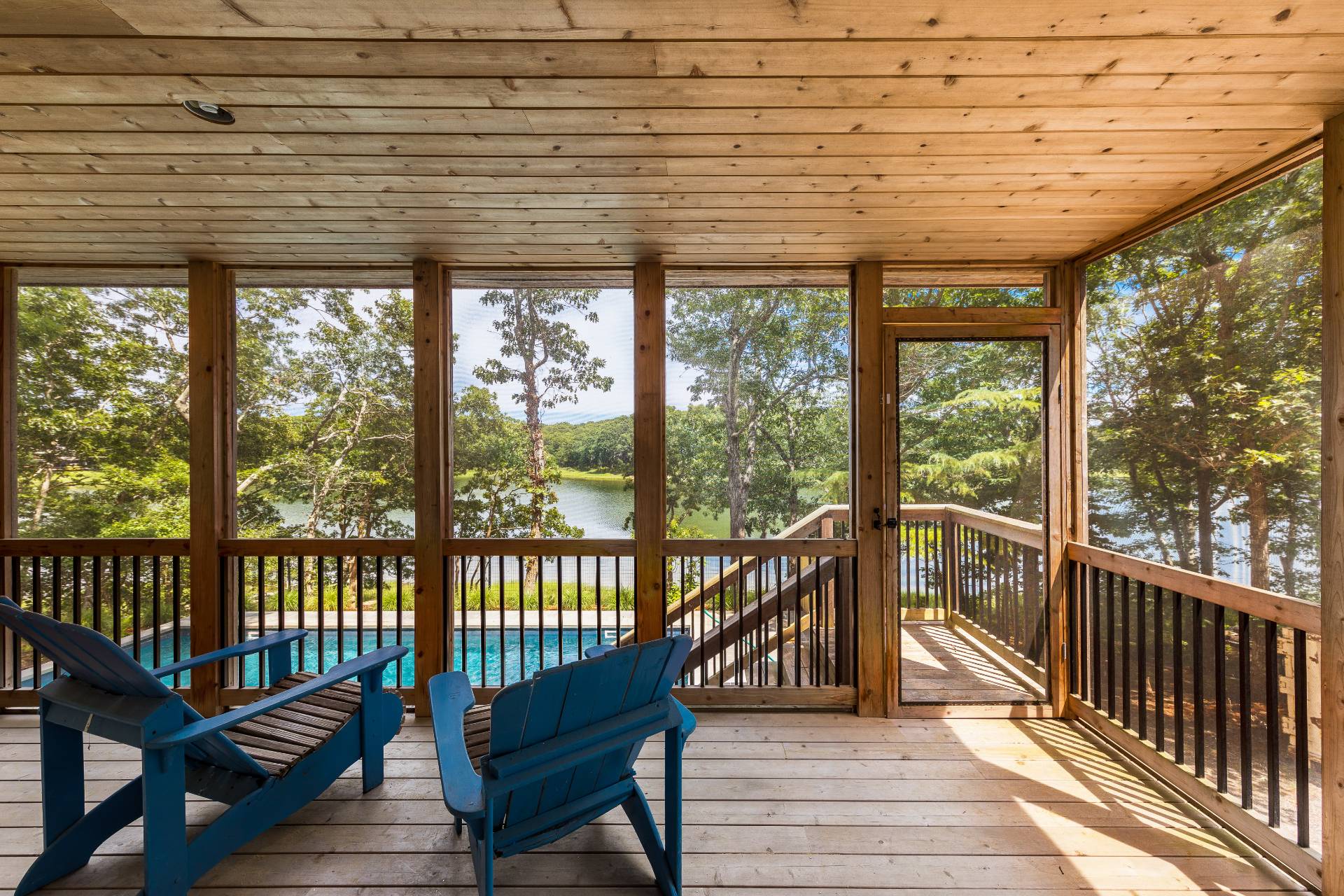 93 Isle Of Wight Road East Hampton, NY 11937 - Photo 9 of 17 a view of a balcony with wooden floor