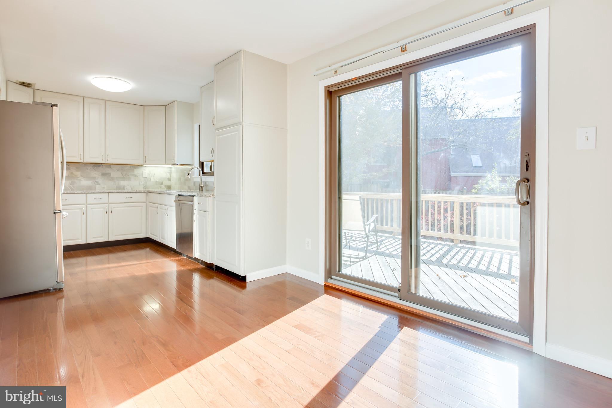 10901 Knights Bridge Court Reston, VA 20190 - Photo 11 of 30 Kitchen - Sliding Glass Door to Deck