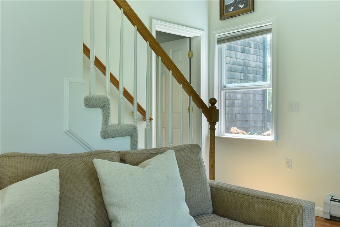 16 Biscuit City Road Richmond, RI 02836 - Photo 17 of 39 More natural light from a window with charming flower box at the base of stairs to the second floor