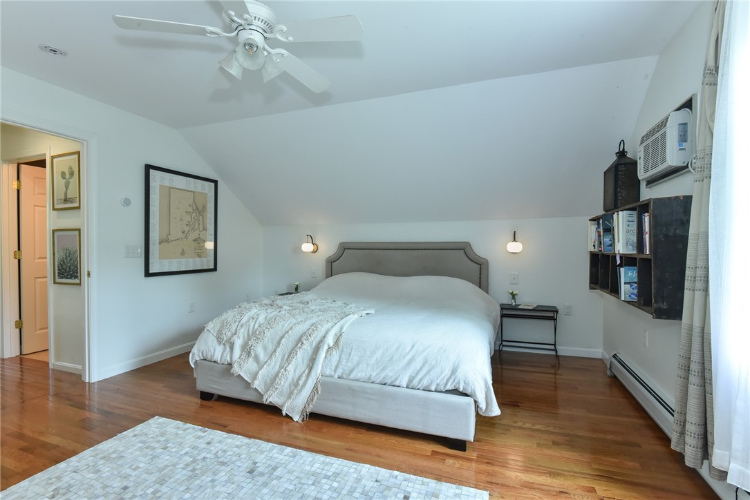16 Biscuit City Road Richmond, RI 02836 - Photo 19 of 39 Spacious primary bedroom with hardwood floors