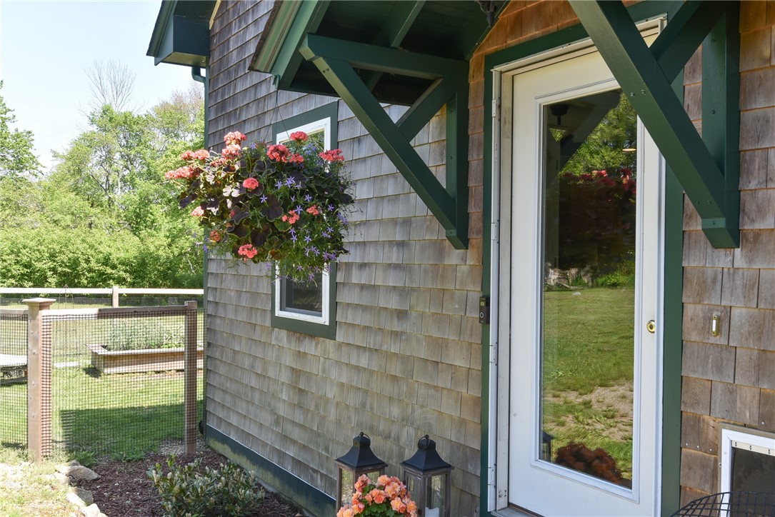 16 Biscuit City Road Richmond, RI 02836 - Photo 2 of 39 This charming shingled Cape home is set on an idyllic parcel of land with the Pawcatuck River winding by.