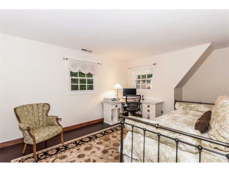 8 Milton Place Rowayton, CT 06853 - Photo 11 of 20 a living room with a couch and a table
