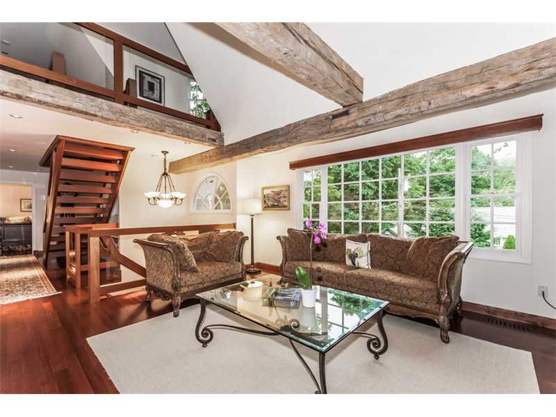 8 Milton Place Rowayton, CT 06853 - Photo 2 of 20 a living room with furniture and a large window