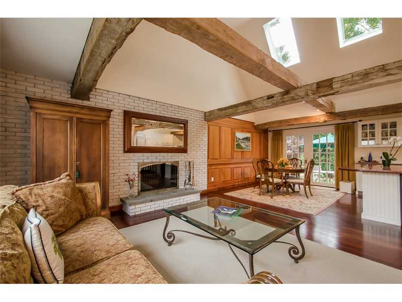 8 Milton Place Rowayton, CT 06853 - Photo 3 of 20 a living room with furniture a fireplace and a flat screen tv