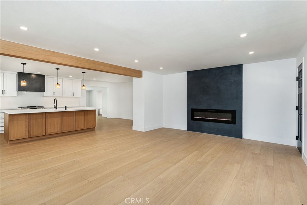37455 Quarter Valley Road Temecula, CA 92592 - Photo 11 of 64 a view of a kitchen with a sink and a refrigerator