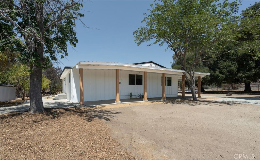 37455 Quarter Valley Road Temecula, CA 92592 - Photo 13 of 64 a view of a house with a yard