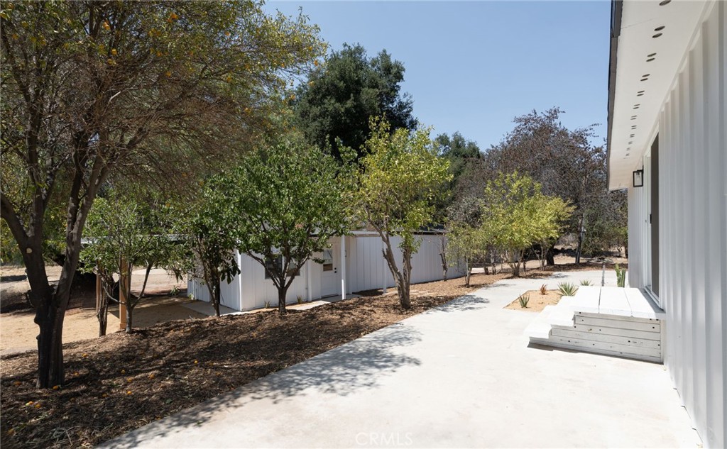 37455 Quarter Valley Road Temecula, CA 92592 - Photo 17 of 64 a street view with large trees