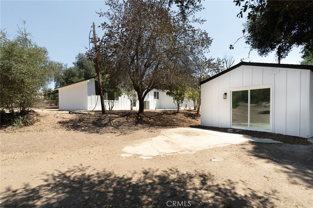 37455 Quarter Valley Road Temecula, CA 92592 - Photo 23 of 64 a front view of a house with a yard covered in snow