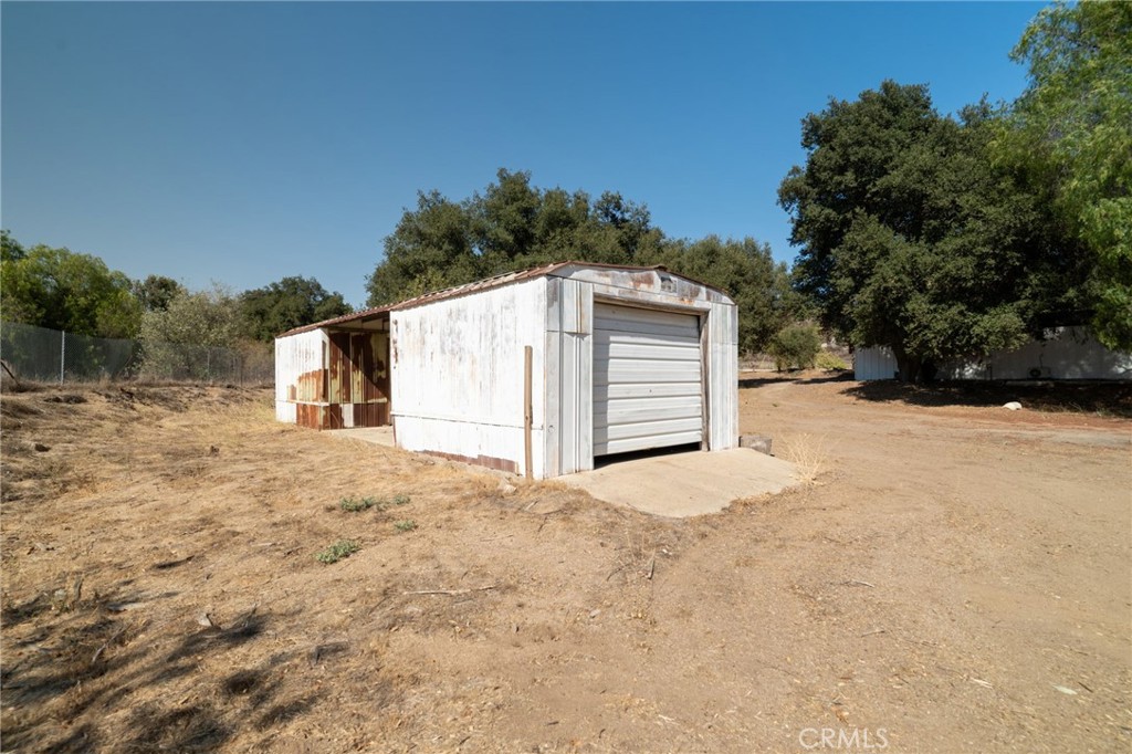 37455 Quarter Valley Road Temecula, CA 92592 - Photo 30 of 64 a view of a house with a snow in the yard