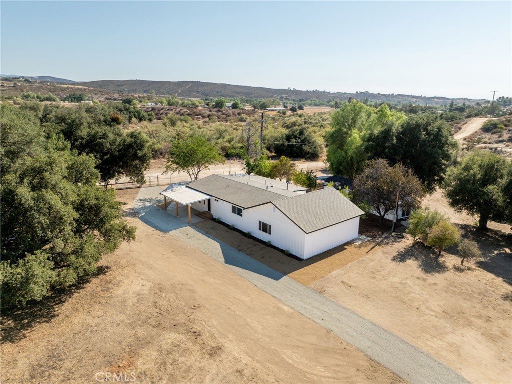 37455 Quarter Valley Road Temecula, CA 92592 - Photo 40 of 64 a view of a terrace with a forest