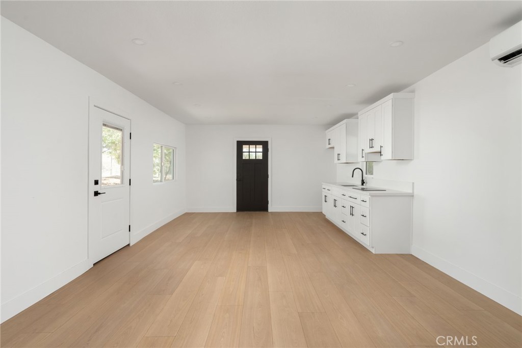 37455 Quarter Valley Road Temecula, CA 92592 - Photo 4 of 64 a view of an empty room and window