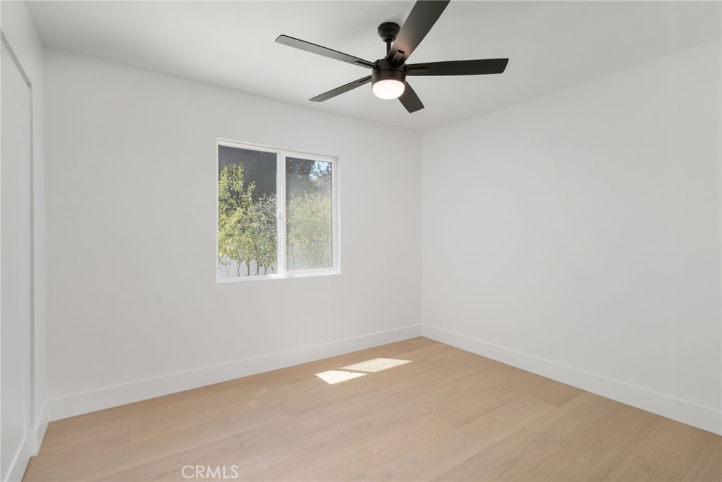 37455 Quarter Valley Road Temecula, CA 92592 - Photo 50 of 64 an empty room with a window and a fan