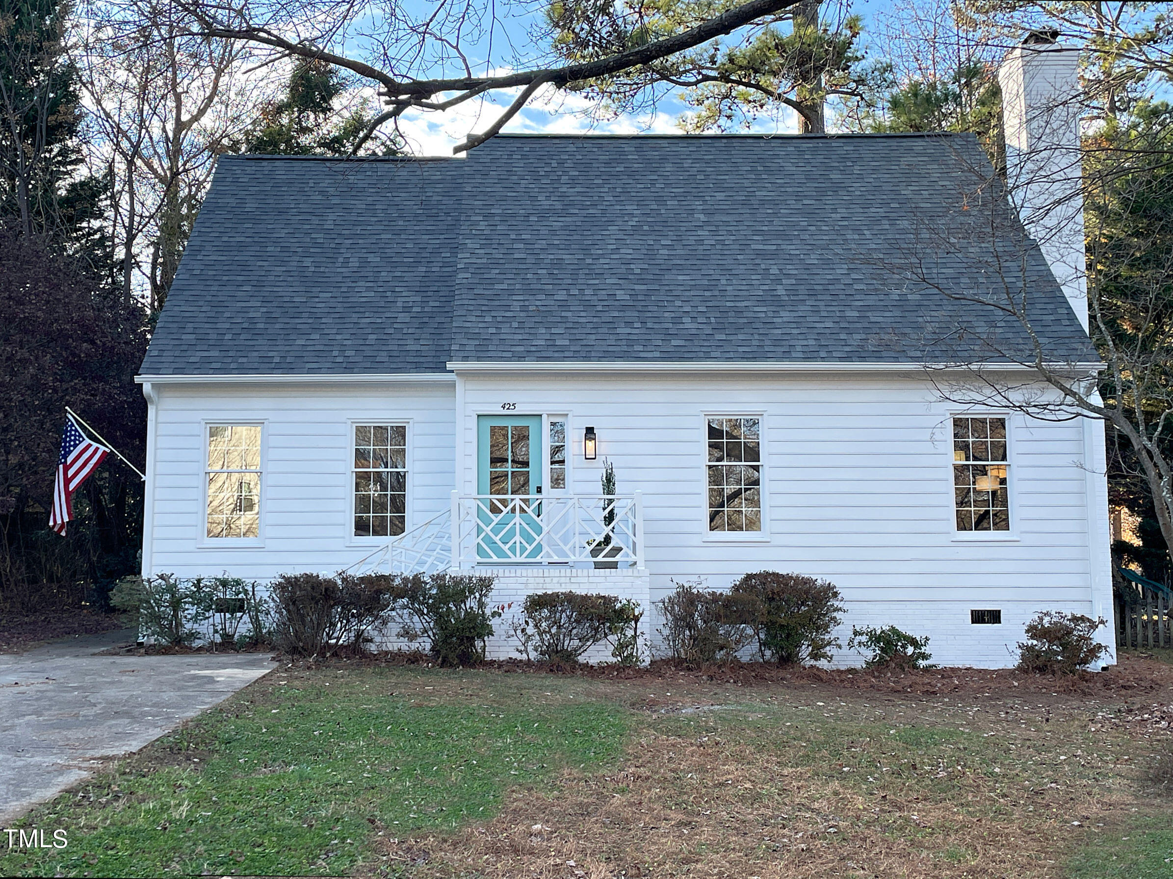 front view of a house with a yard