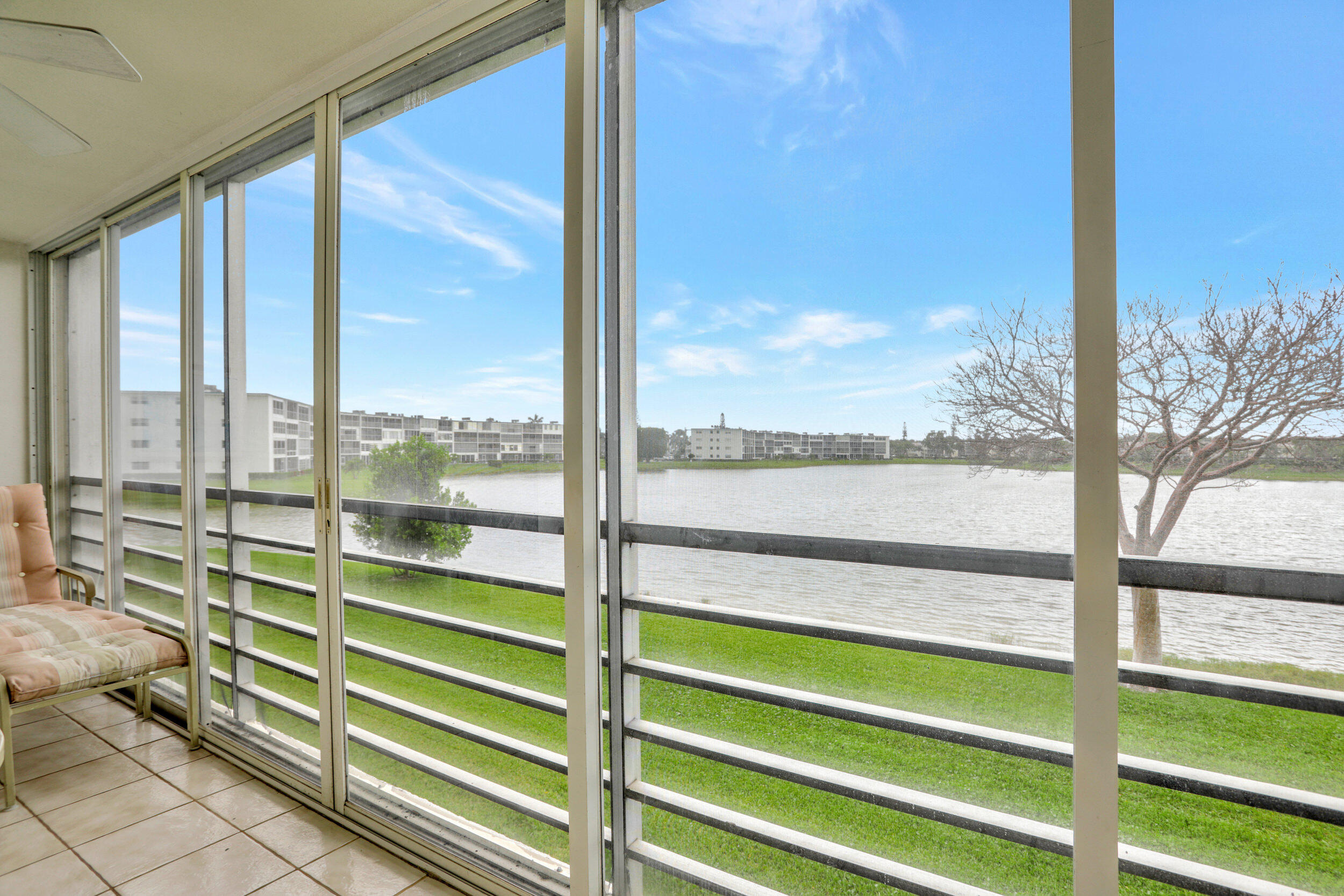 2037 Cornwall East Boca Raton, FL 33434 - Photo 20 of 26 LAKE VIEW WIRTH GLASS IMPACT SLIDERS