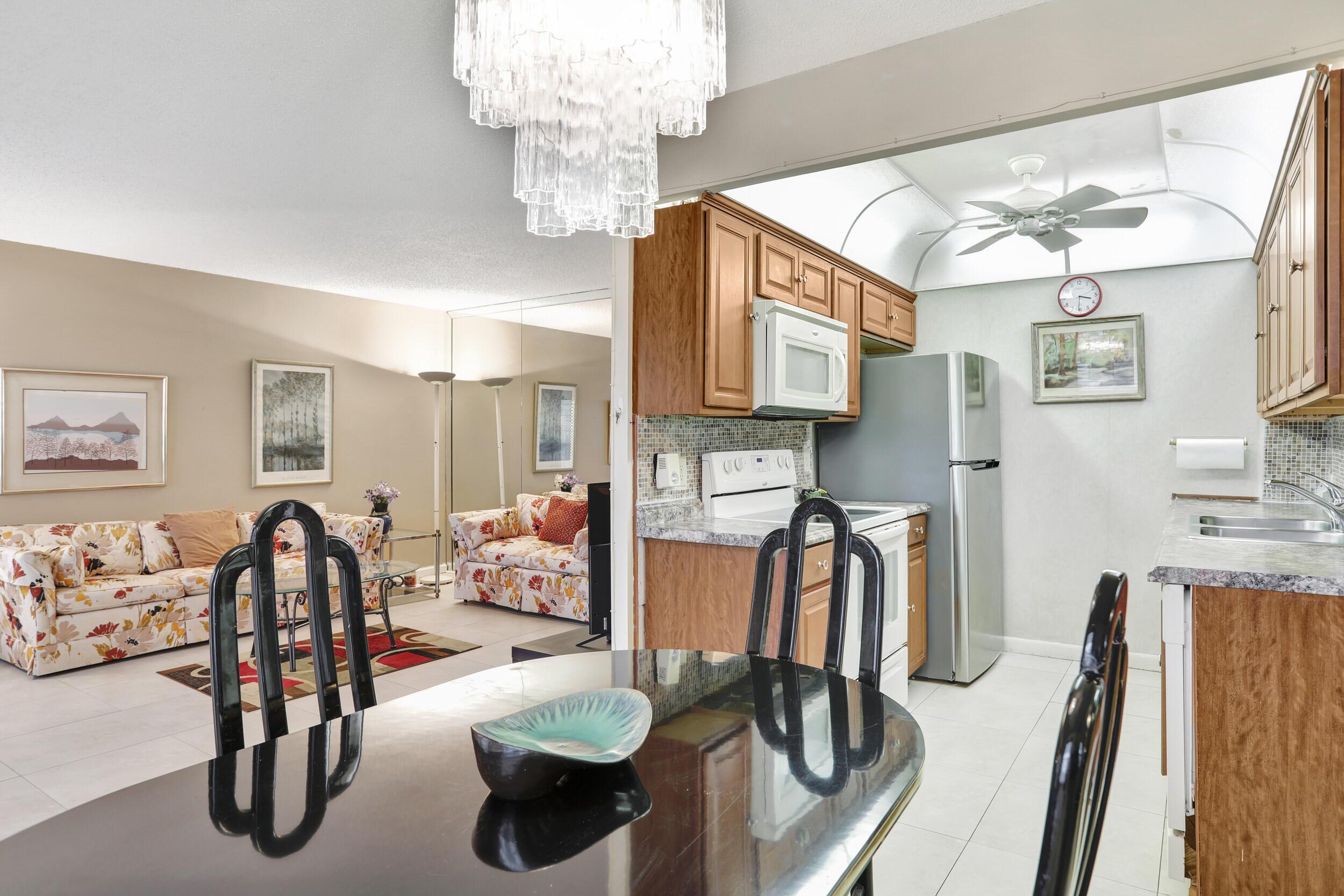 2037 Cornwall East Boca Raton, FL 33434 - Photo 6 of 26 Dining Room/Kitchen/Living Room Area