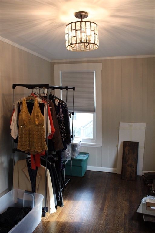 295 Haven Reading Ma, Unit 1 Reading, MA 01867 - Photo 13 of 16 a view of walk in closet with clothes and shoes