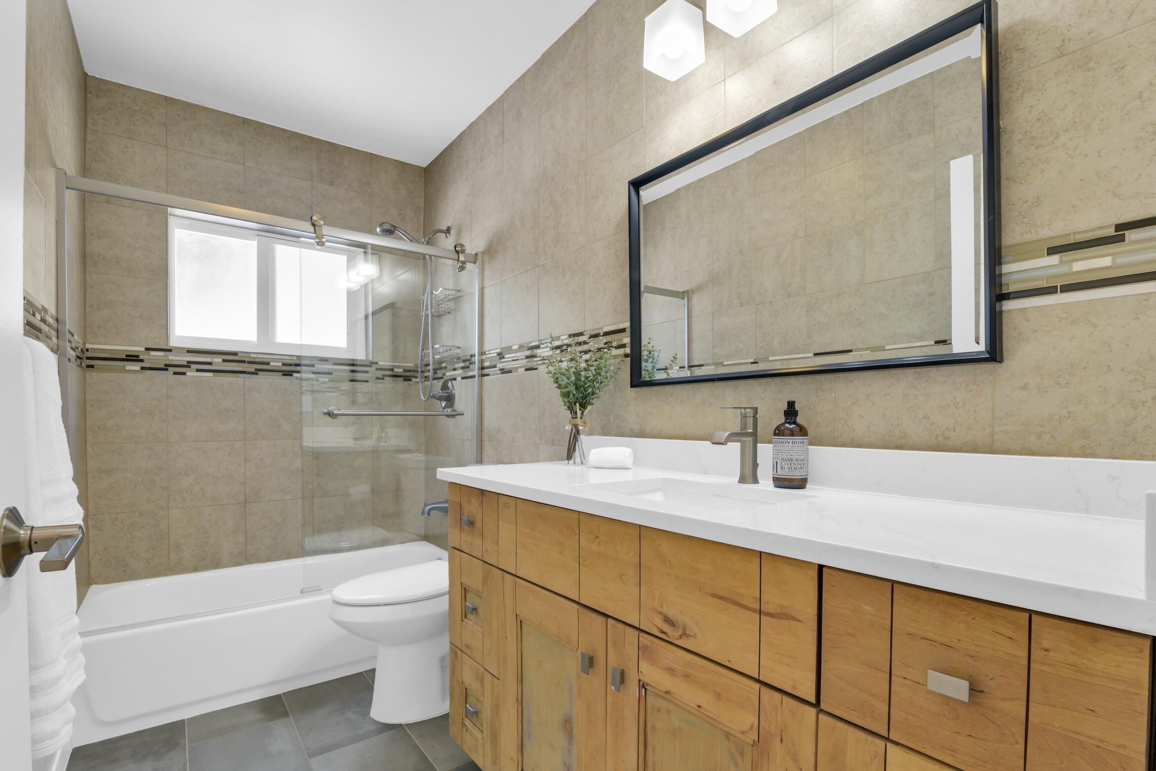 701 Appleby Street Boca Raton, FL 33487 - Photo 37 of 47 a bathroom with a sink a toilet and shower