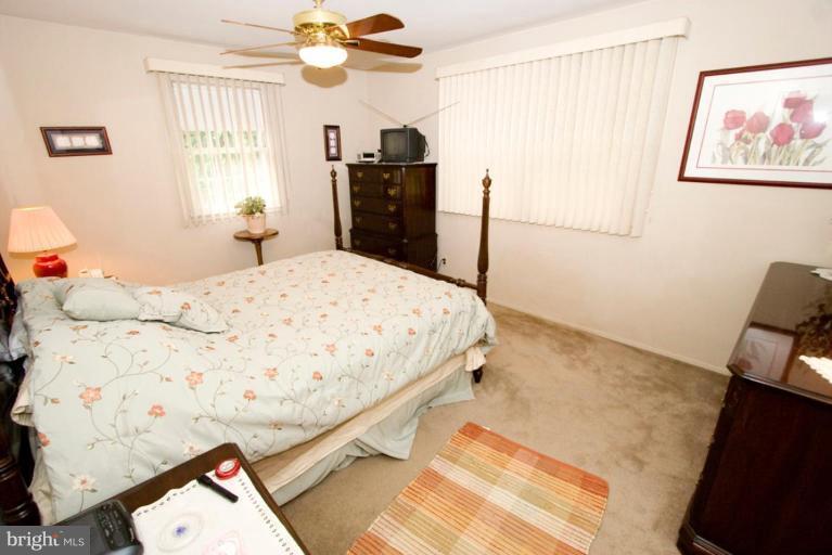 5507 Moultrie Road Springfield, VA 22151 - Photo 20 of 30 Hardwood Under Carpets on Upper Level