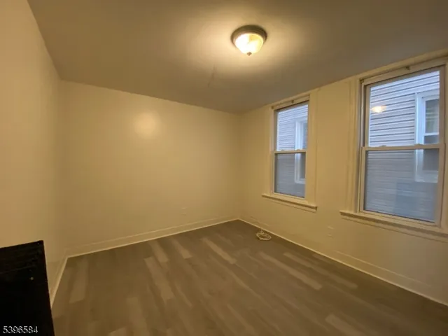 en empty room with windows