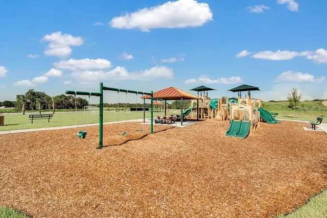 a view of a golf course with a lake